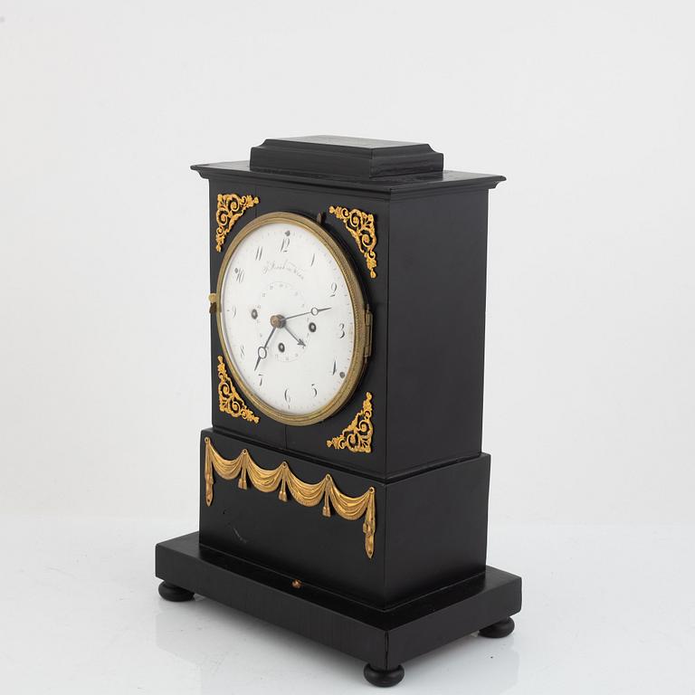 An Austrian Empire early 19th century mantel clock.