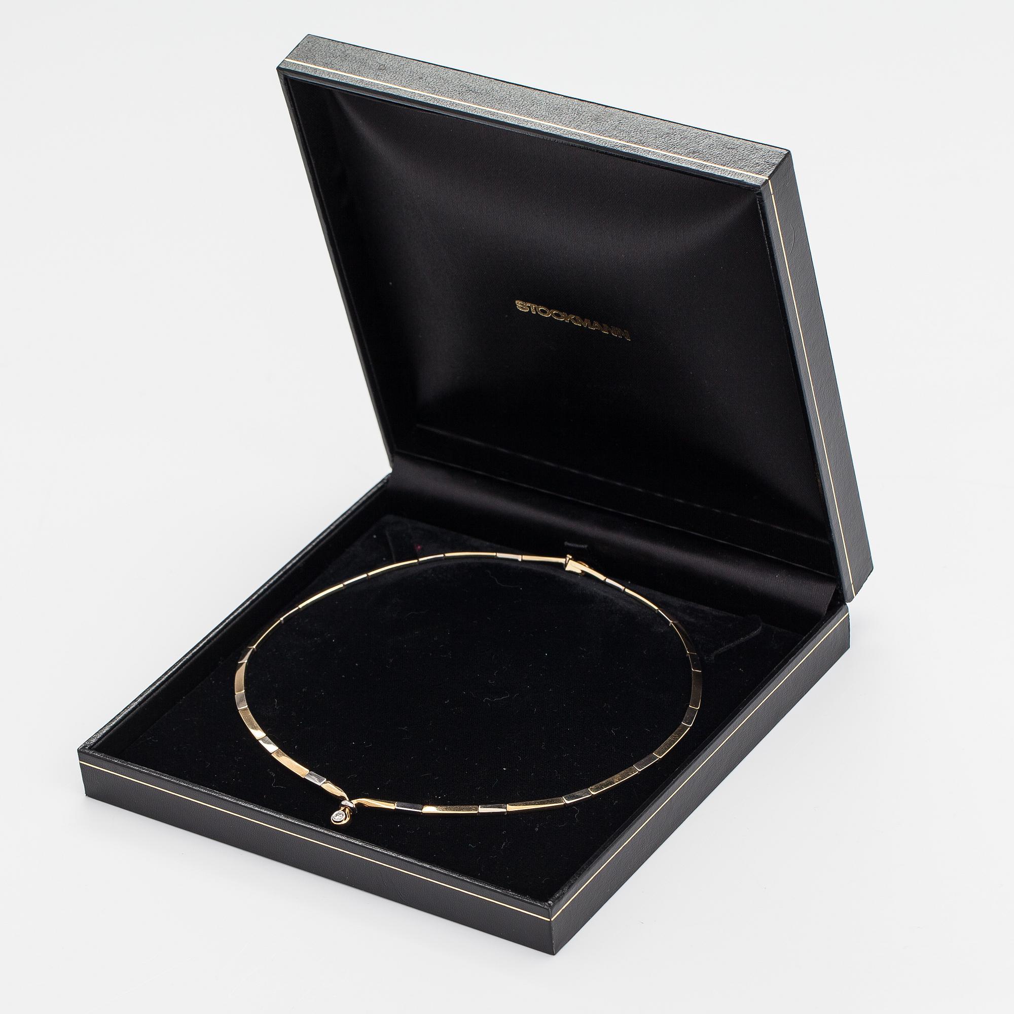 Halsband, 18K vit- och gultguld, diamant ca 0.10 ct.