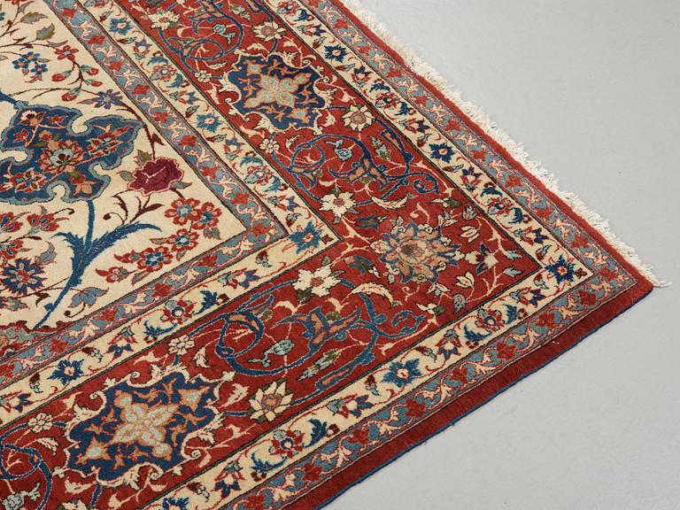 A old Esfahan carpet, around 299 x 210 cm.