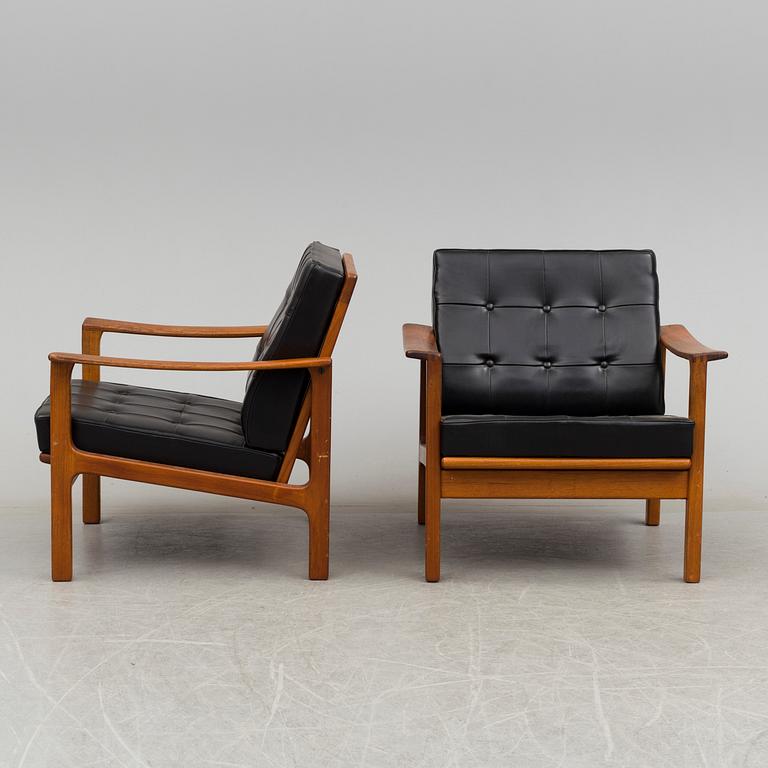a pair of 1960's armchairs.