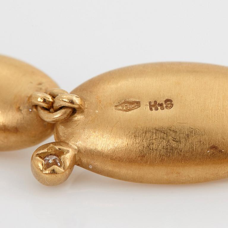 Collier Stern "Justine" 18K guld med cabochonslipad bergkristall och runda briljantslipade diamanter.