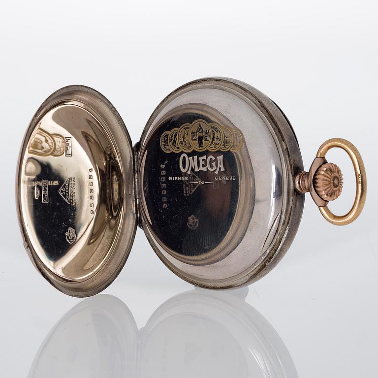 TASKUKELLO, Omega, hopeaa, 1900-luvun alku halkaisija noin 5 cm.