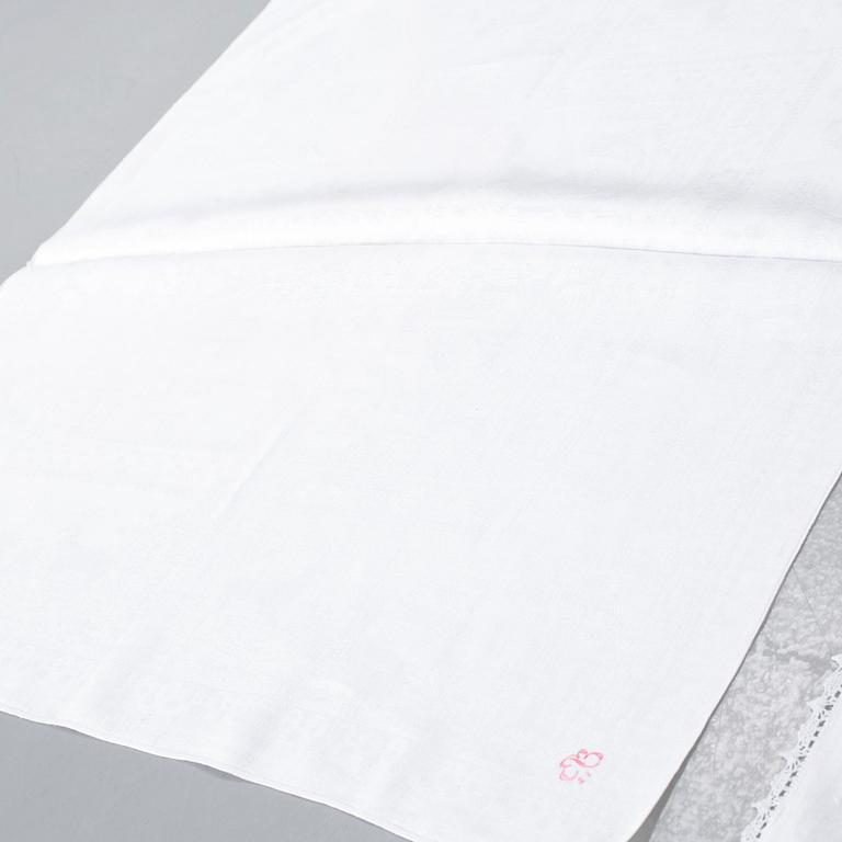 Three 19th century damask napkins.