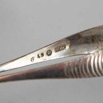 A silver sugar bowl and tongs, Gustaf Möllenborg, Stockholm 1831 and Michael Olof Barkman, Varberg 1824.