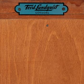 A mahogany veneered cabinet, Ferdinand Lundquist, Gothenburg, mid 20th Century.