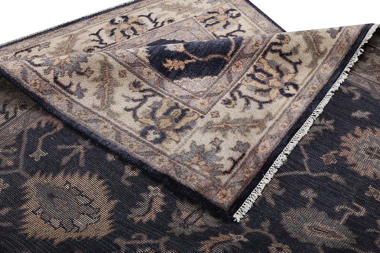 A Mamluk design carpet, c. 305 x 245 cm.