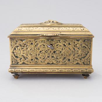 A Renaissance style brass box, Adolf Frankau & Co, London, from the late 19th century.