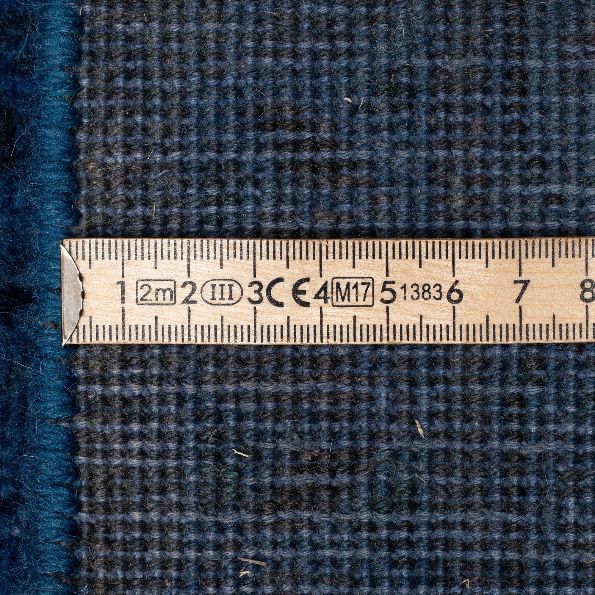 An oriental carpet, ca 408 x 299 cm.