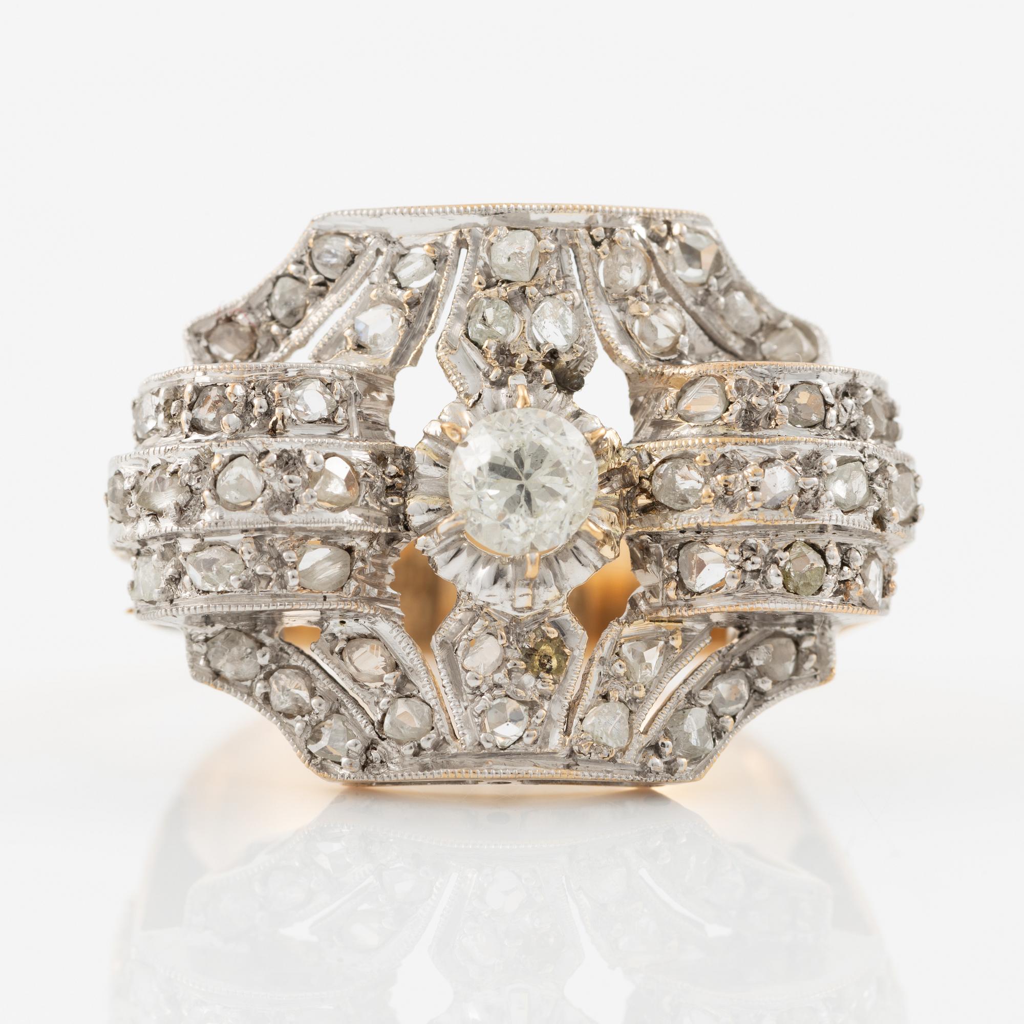 Ring in 18K gold and platinum set with an old-cut diamond and rose-cut diamonds.
