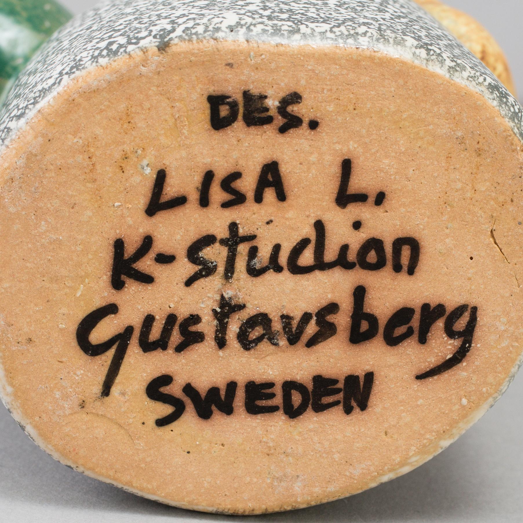A set of four stoneware figurines by Lisa Larson for Gustavsberg.