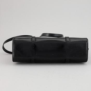 Prada, a patent leather bag.