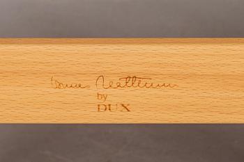 FÅTÖLJ samt FOTPALL, "Ingrid", Bruno Mathsson, Dux, brännmärkt.