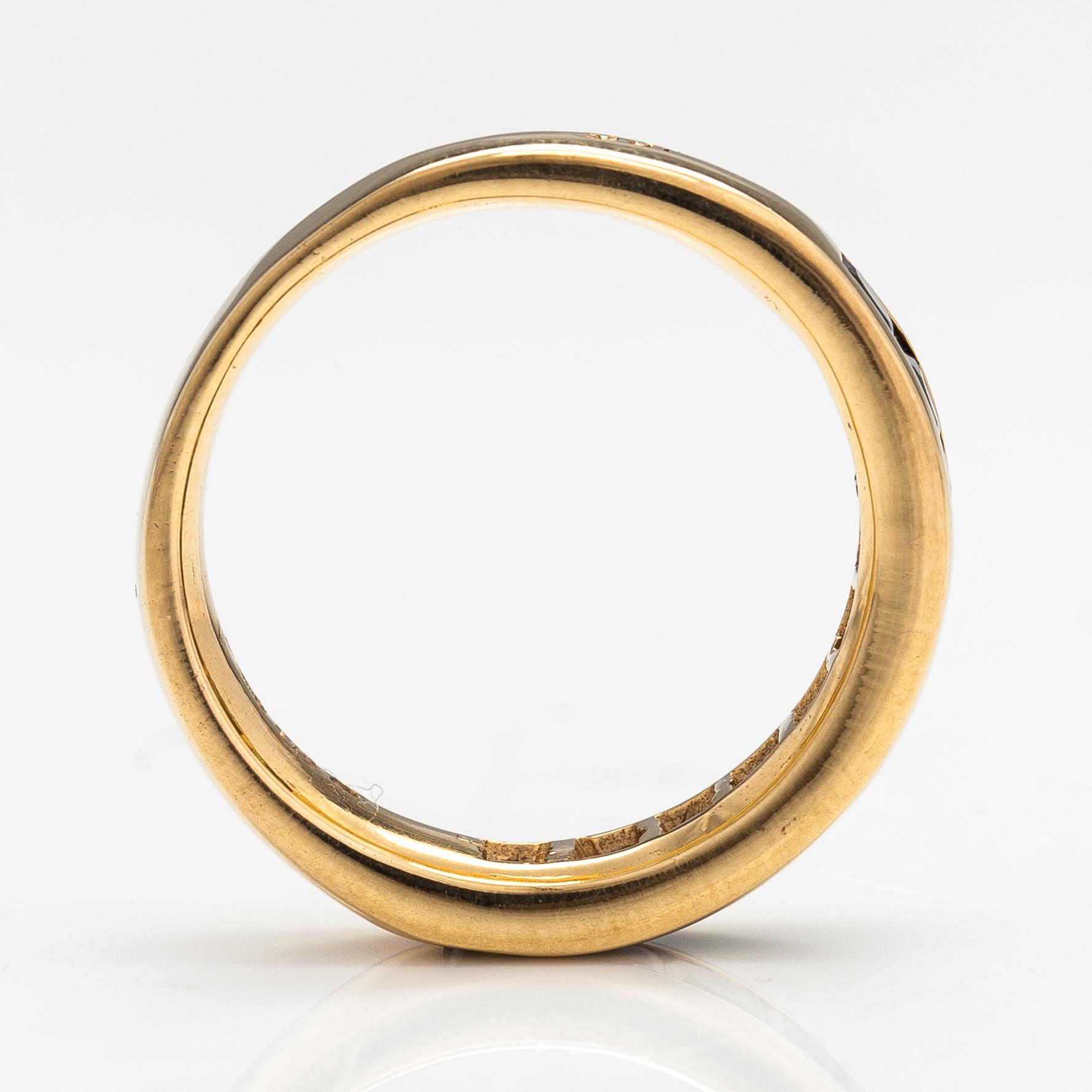 An 18K gold ring with tourmalines. Finland 2002.