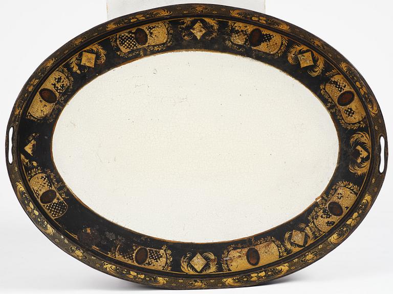 A tole-peinte Empire tray, first part 19th century on a later stand.