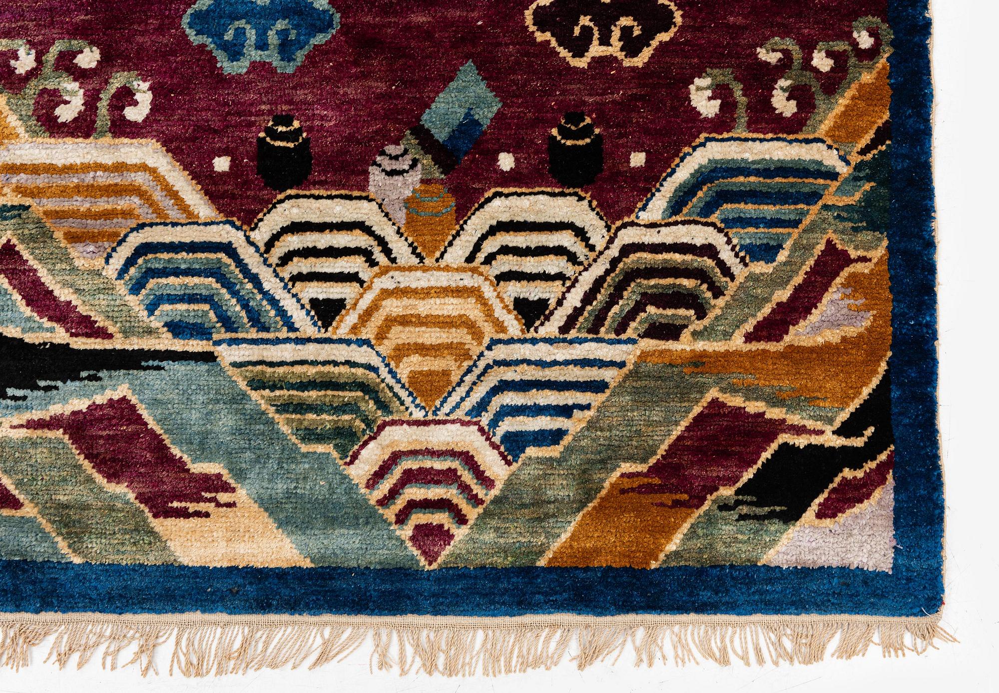 A Chinese silk and metal-thread 'Dragon' pillar rug, Bejing, North China, around 1910, c. 234x151 cm.