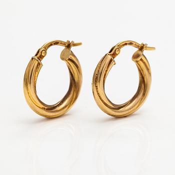 A pair of 14K gold earrings. Italy.