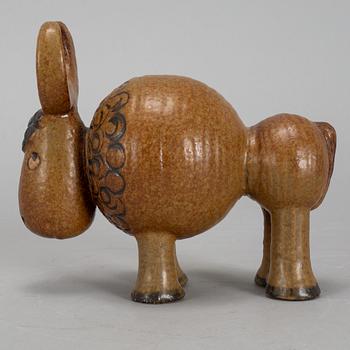 LISA LARSON, a stoneware candelabra and a figurine. Gustavsberg.