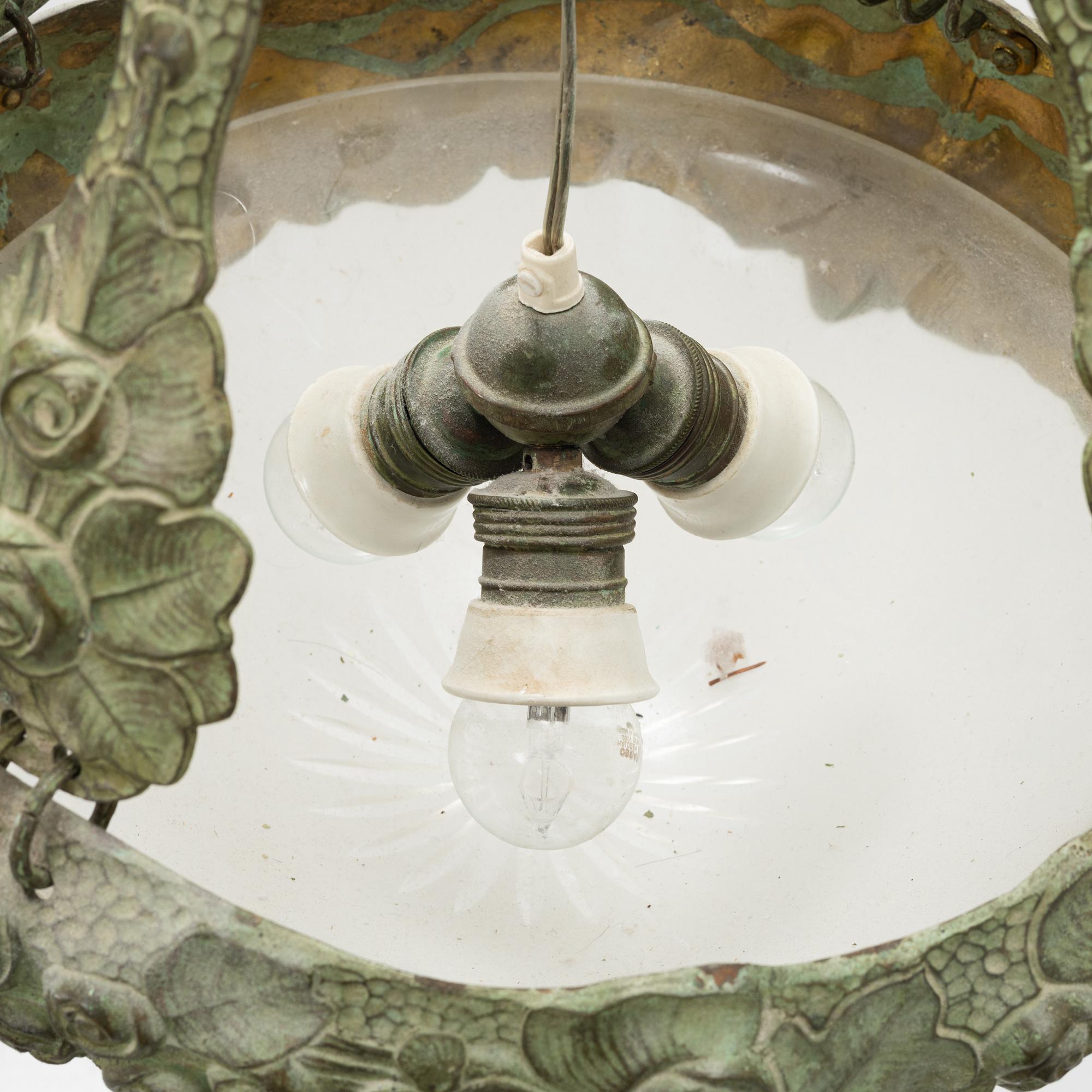 Alice Nordin, taklampa, jugend, patinerad brons, omkring 1900.