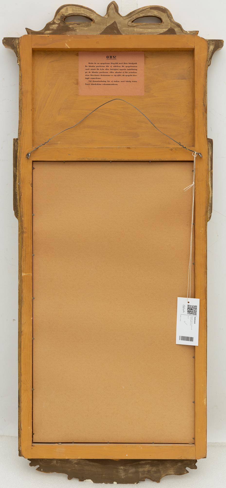 A Gustavian style mirror, mid-20th century.