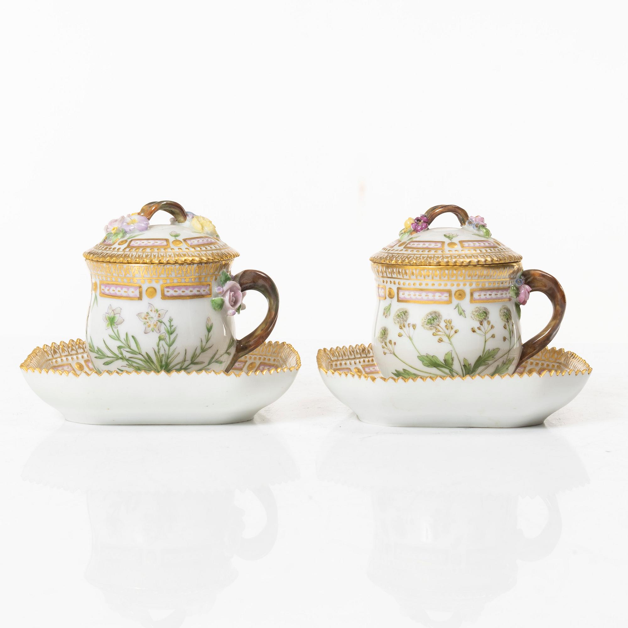 A pair of Royal Copenhagen 'Flora Danica' custard cups with covers and stands, Denmark, 20th century.