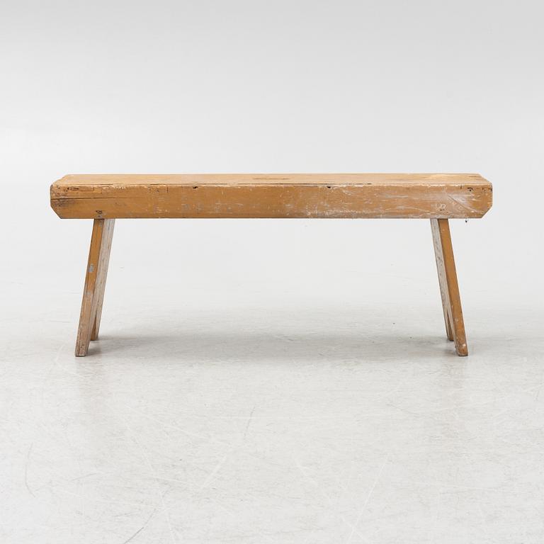 A painted bench, circa 1900.