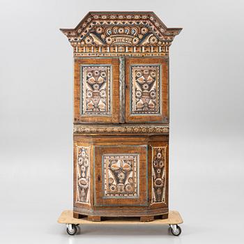 A Swedish Dalecarlian folk art cabinet dated 1808.