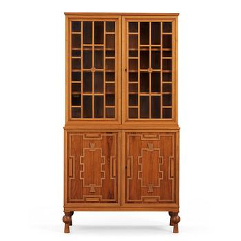 233. A Swedish Grace mahogany showcase cabinet, reportedly a win at the Stockholm Cabinetmaker's association lottery, 1920's.