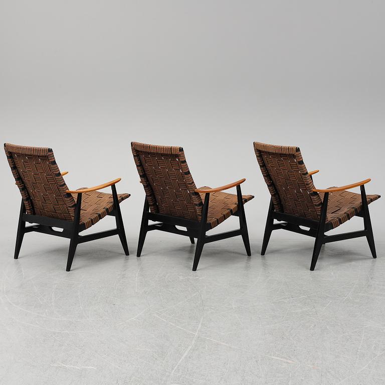 A set of three 1950's easy chairs.