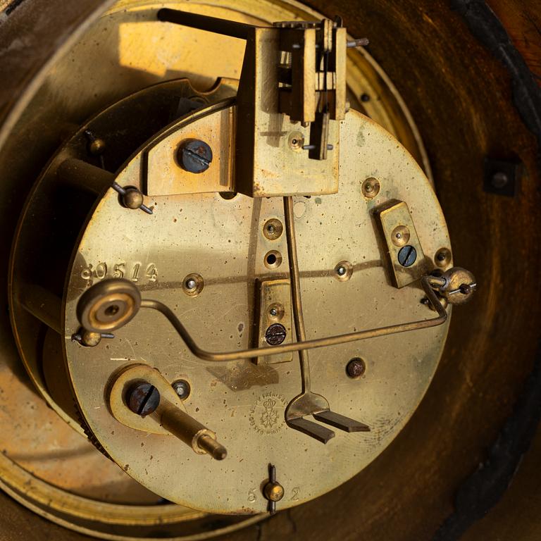 A Louis XVI-style wall clock, first half of the 20th Century.