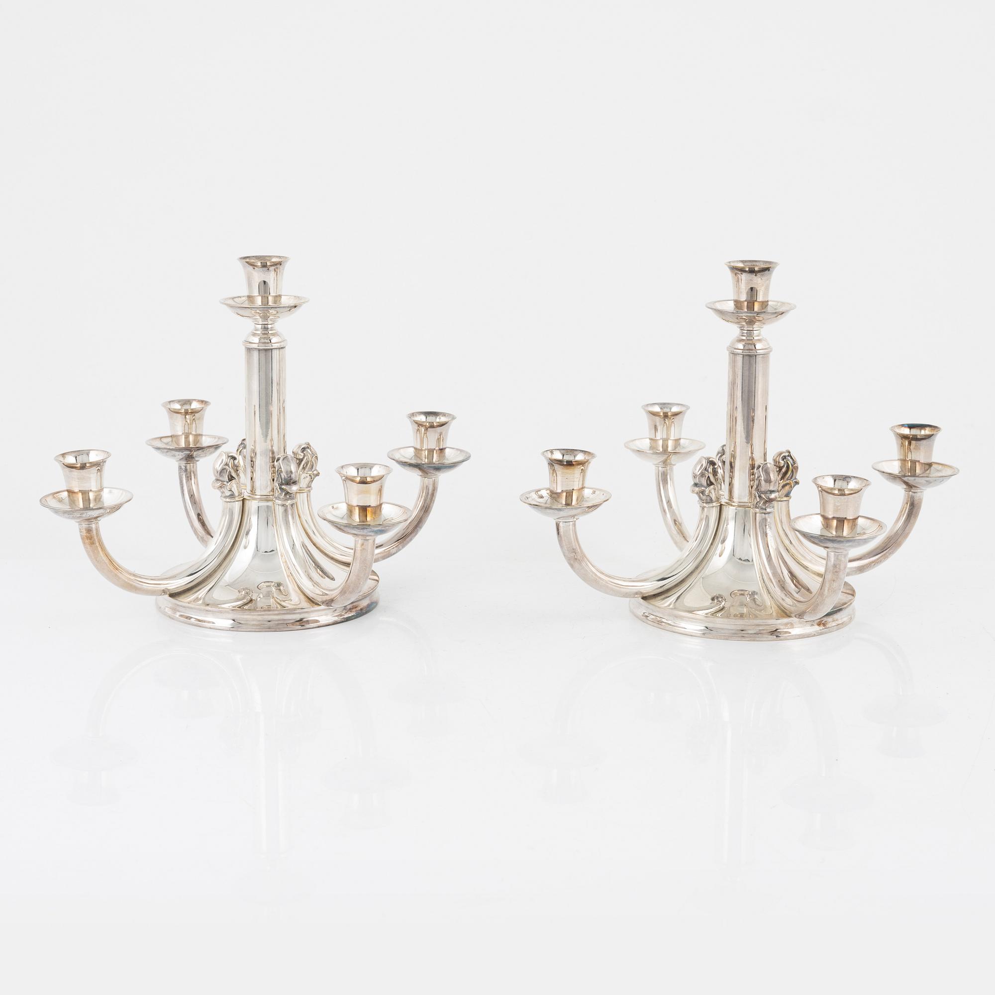 A pair of silver plated candelabra, bearing the mark of Atla, Denmark, second half of the 20th Century.