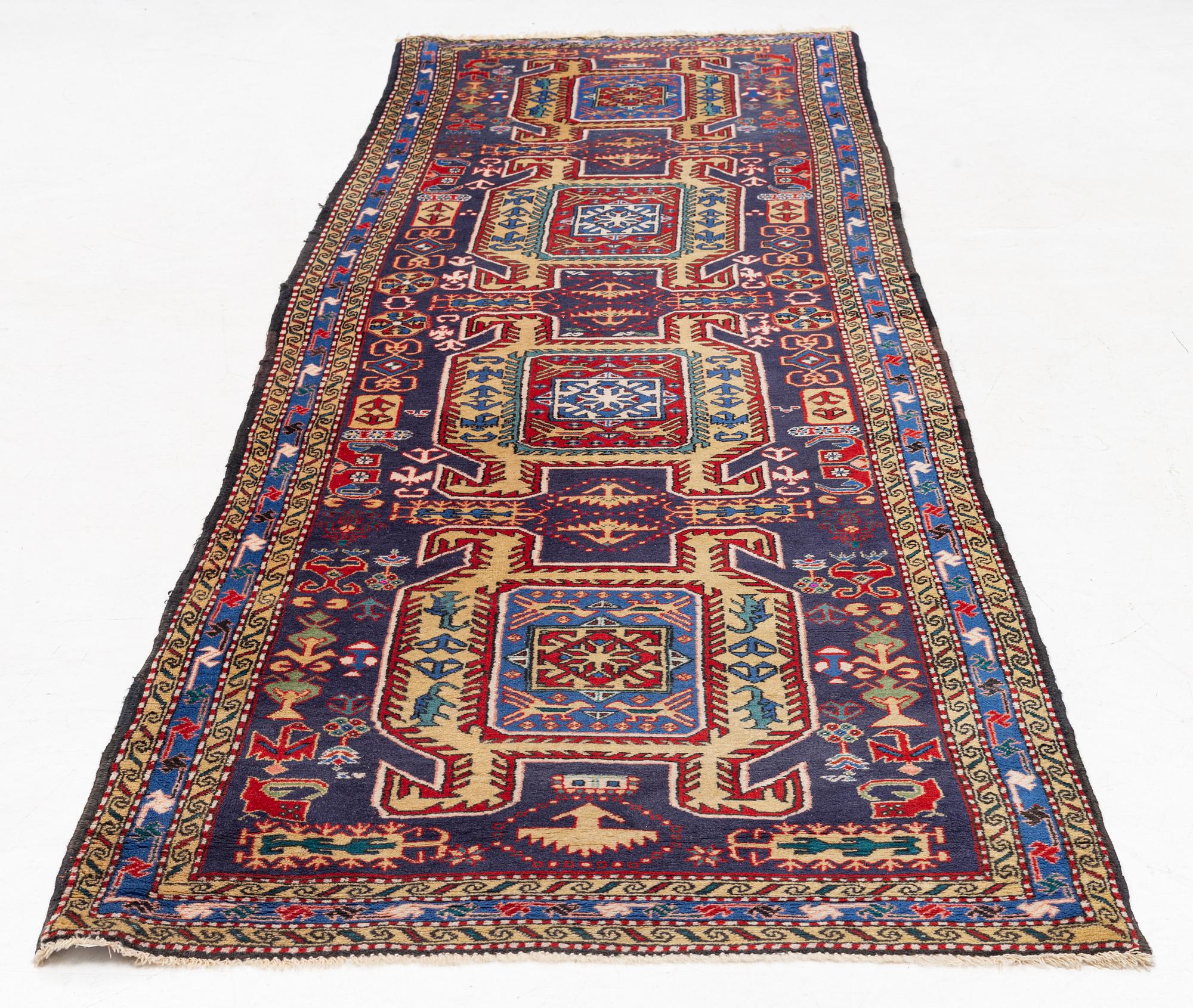 A runner carpet, Northwest Persian, approx. 356 x 114 cm.
