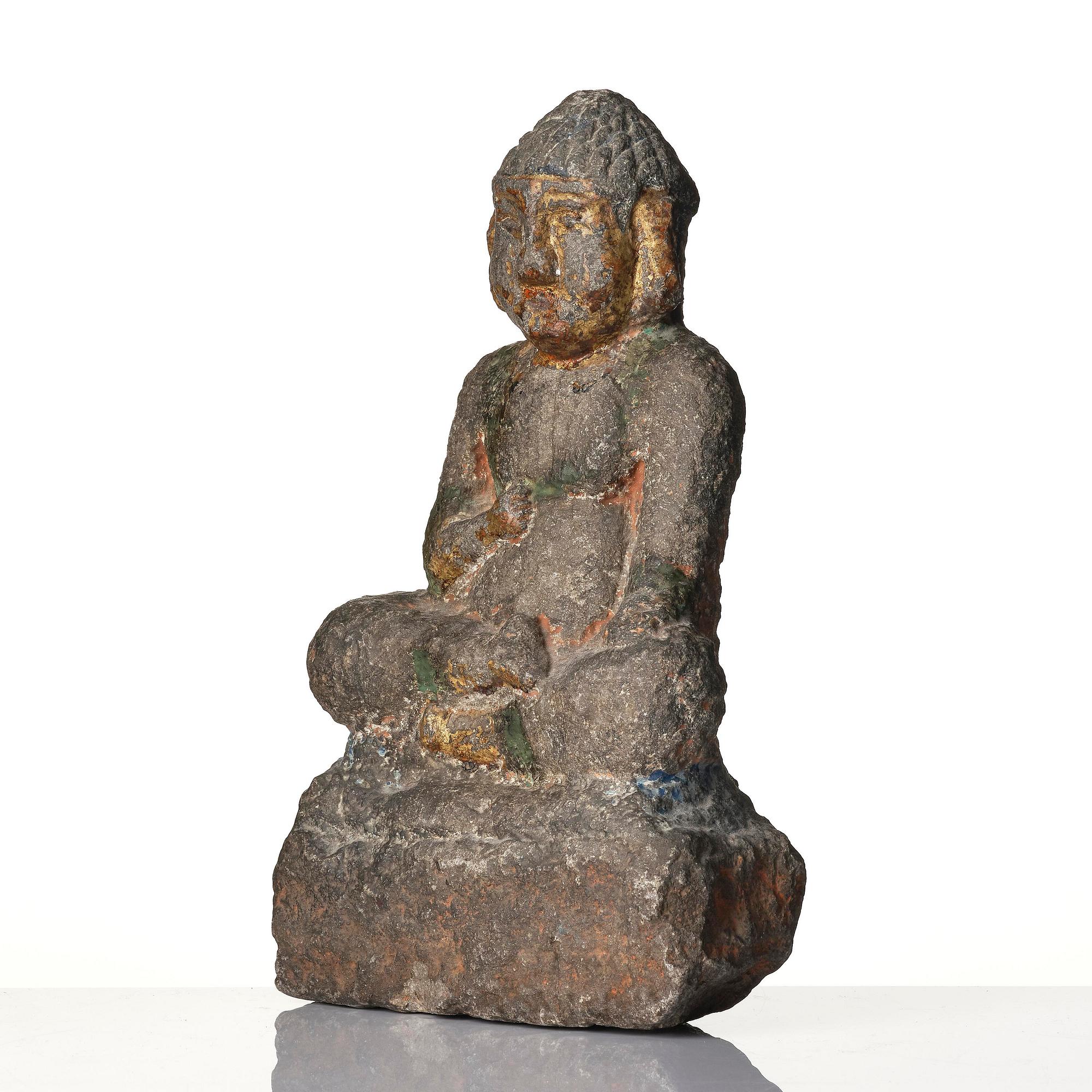 A stone sculpture of Buddha, Ming style.