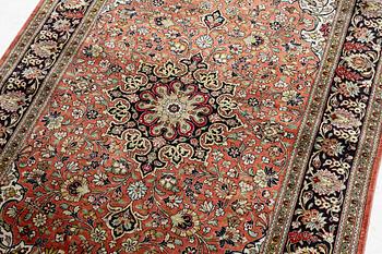 An Oriental part silk rug, c 158 x 110 cm.