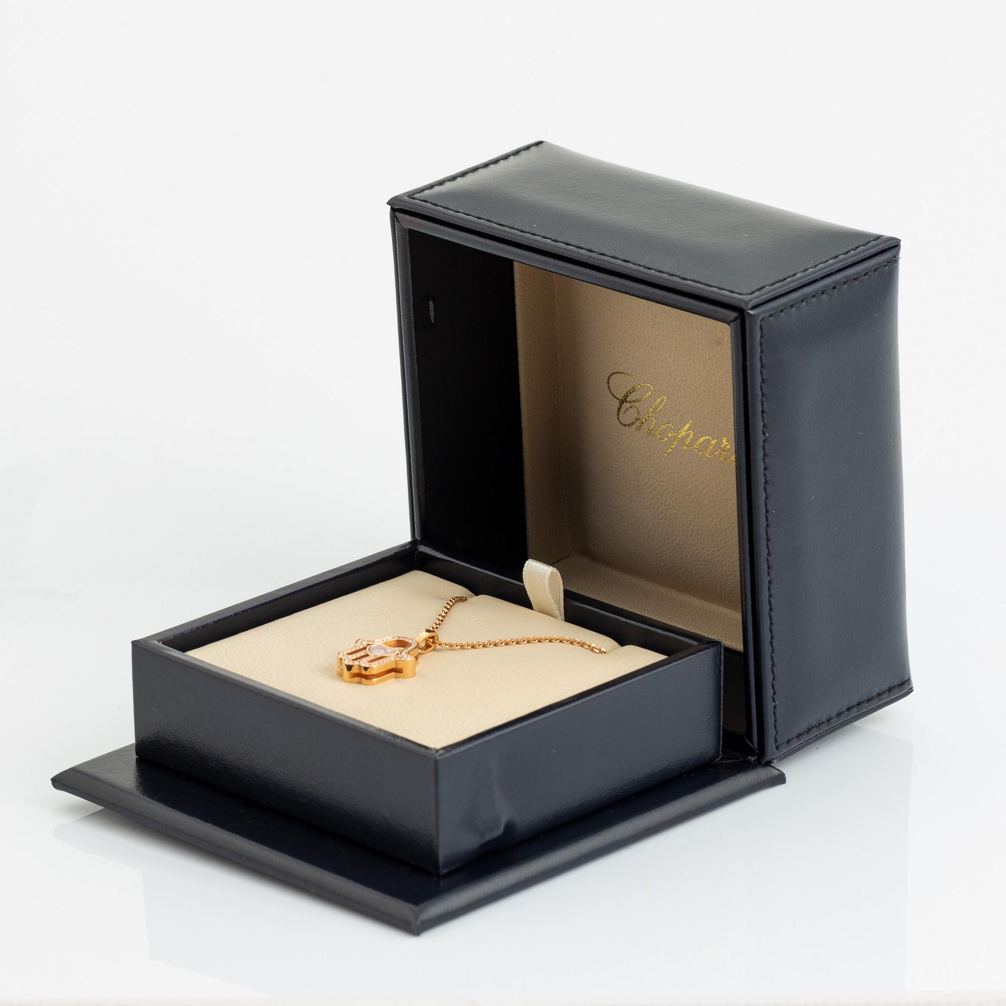 Chopard, Happy diamonds "Fatimas hand" 18K gold and brilliant cut diamond necklace.