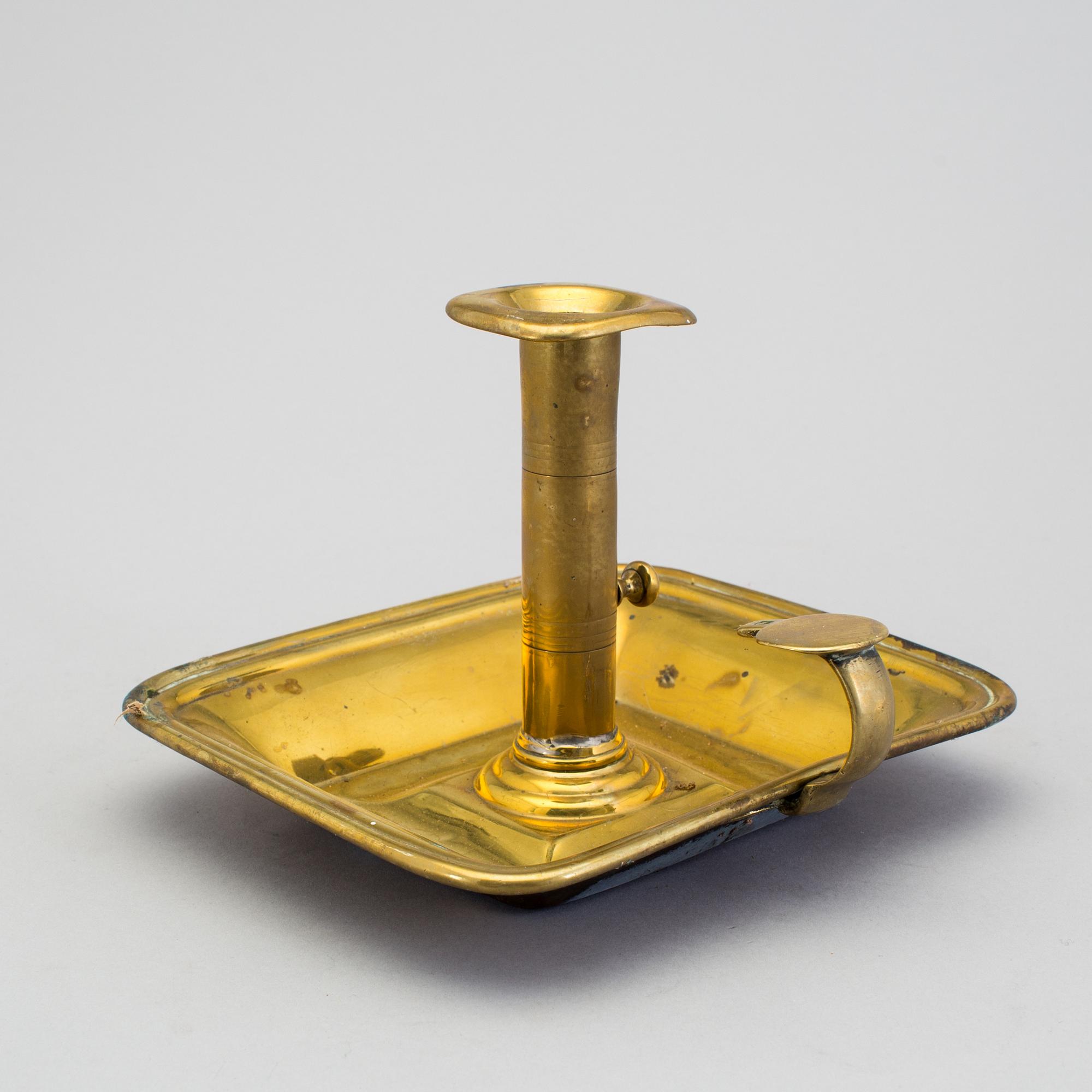 A 19th century brass candlestick.