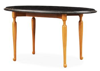 345. A Josef Frank black marble top table on a mahogany and walnut base, Svenskt Tenn, Sweden.