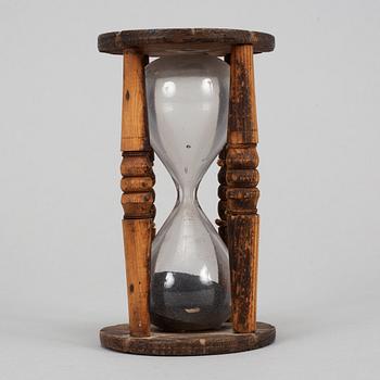 An hourglass, wooden frame, 18th/19th century.