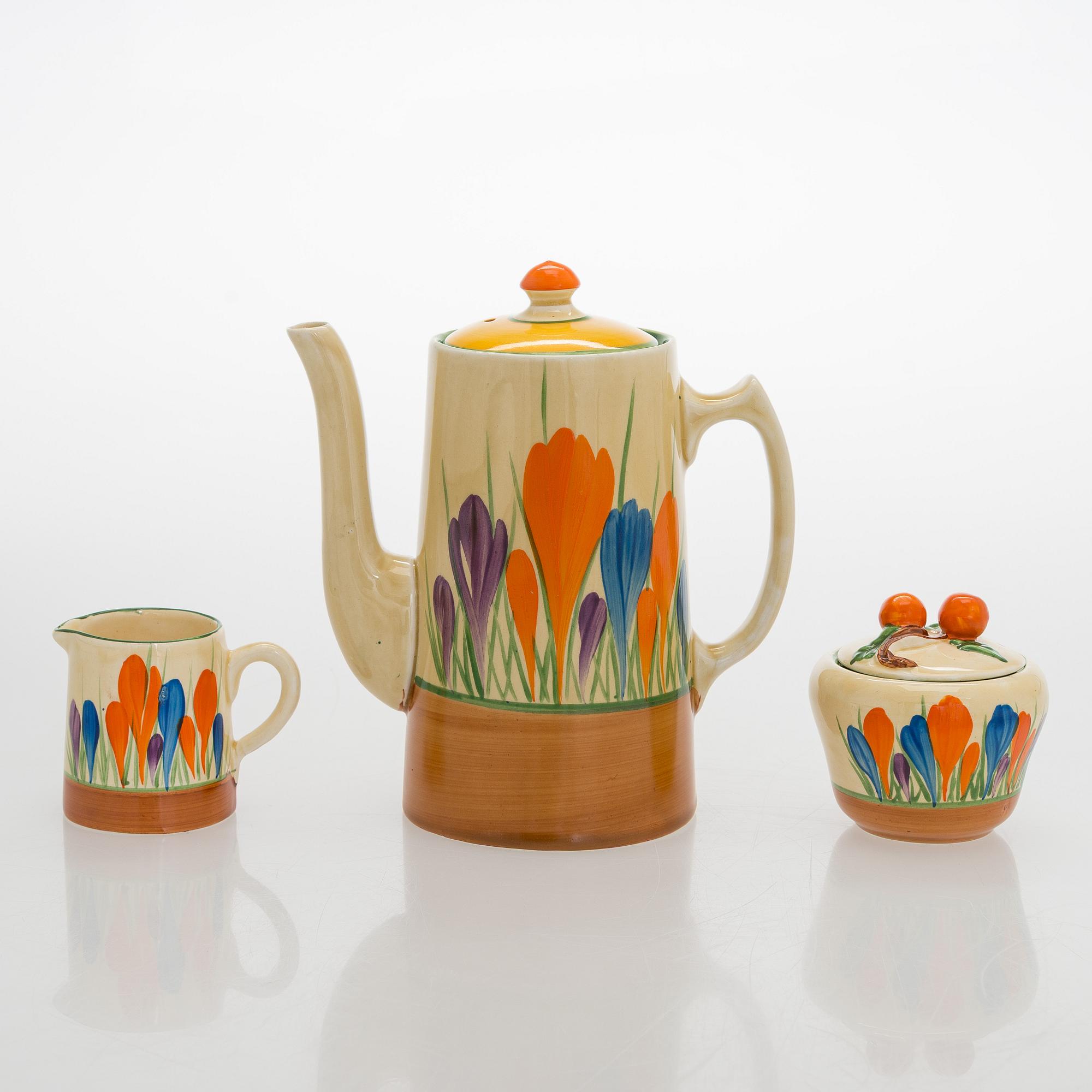 Clarice Cliff, 10-piece coffee service, stamped "Crocus", England.