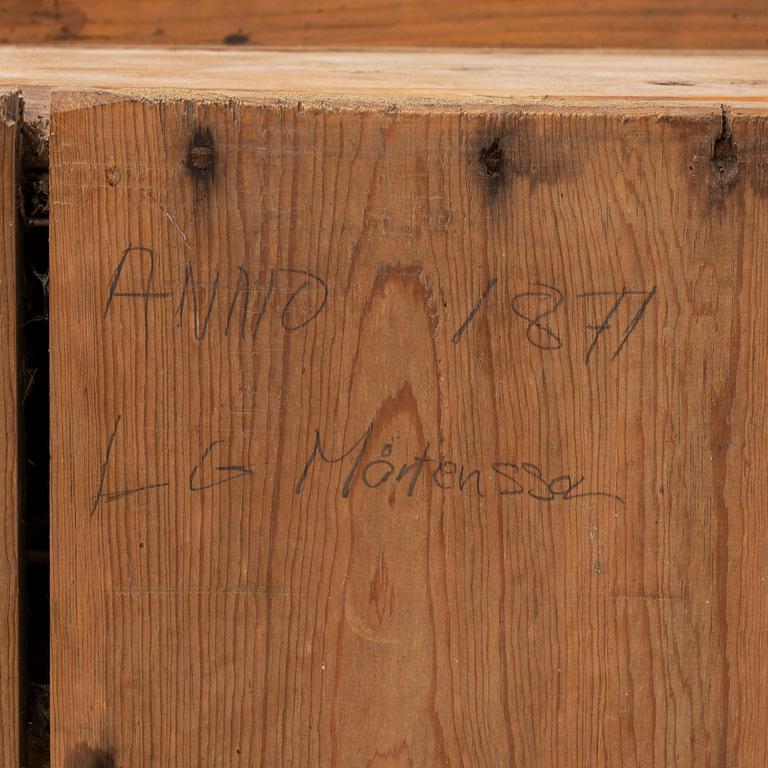 A late 19th century pine cupboard for eggs.