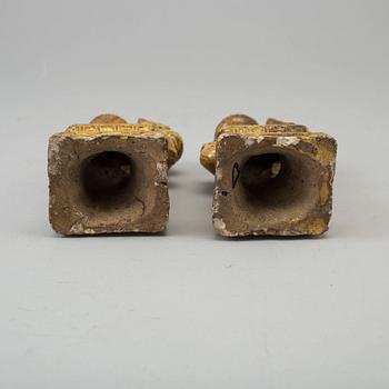 A pair of yellow glazed chinese joss sticks holders, 17th Century.