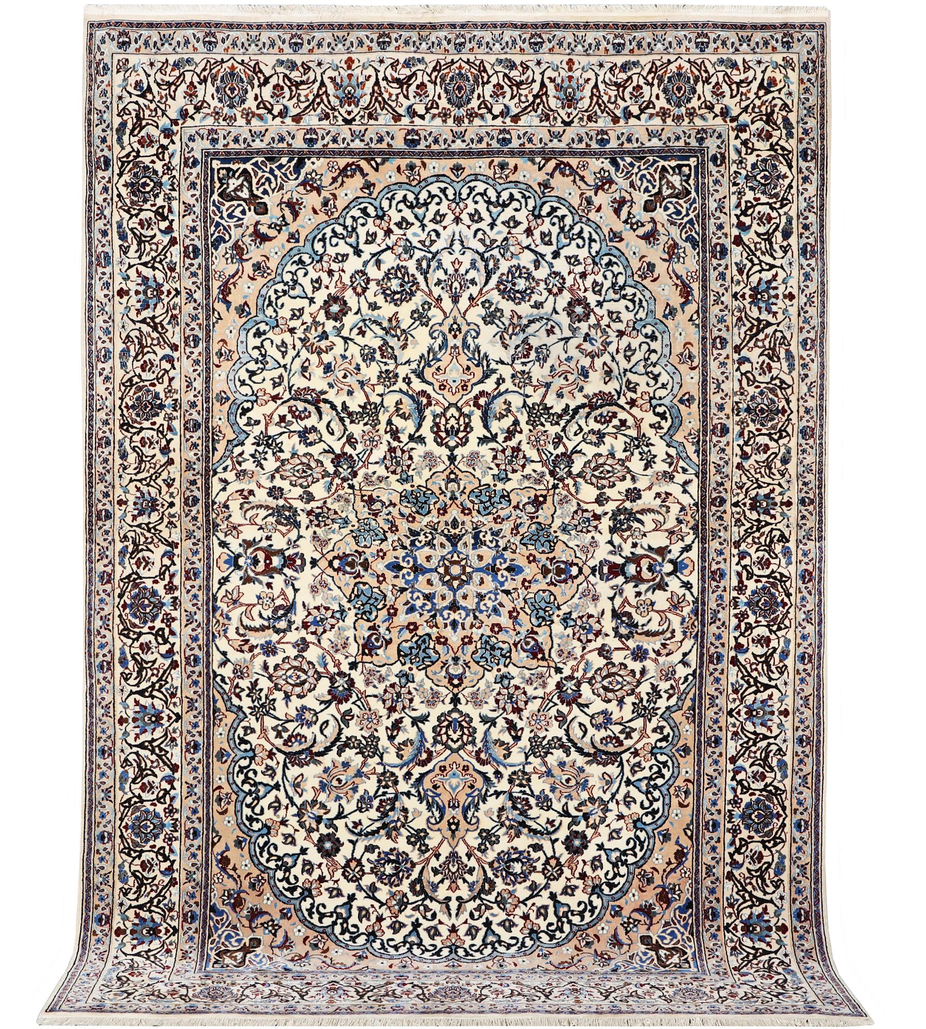 A Nain carpet, part silk, 9 laa, c. 318 x 209 cm.
