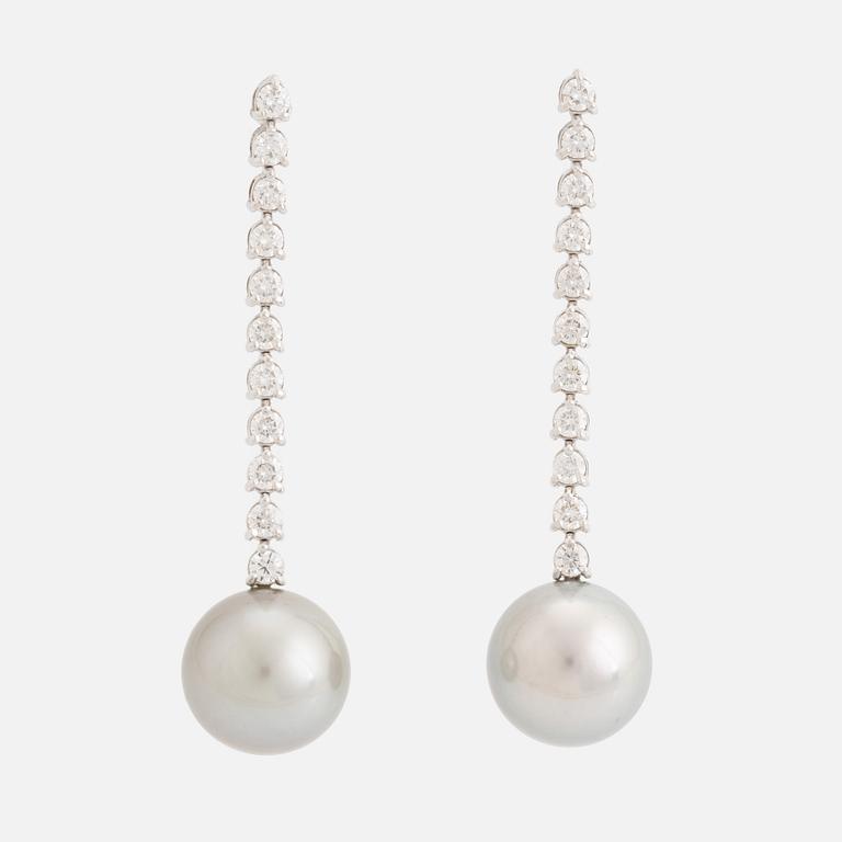 Tahit pearl and brilliant-cut diamond earrings.