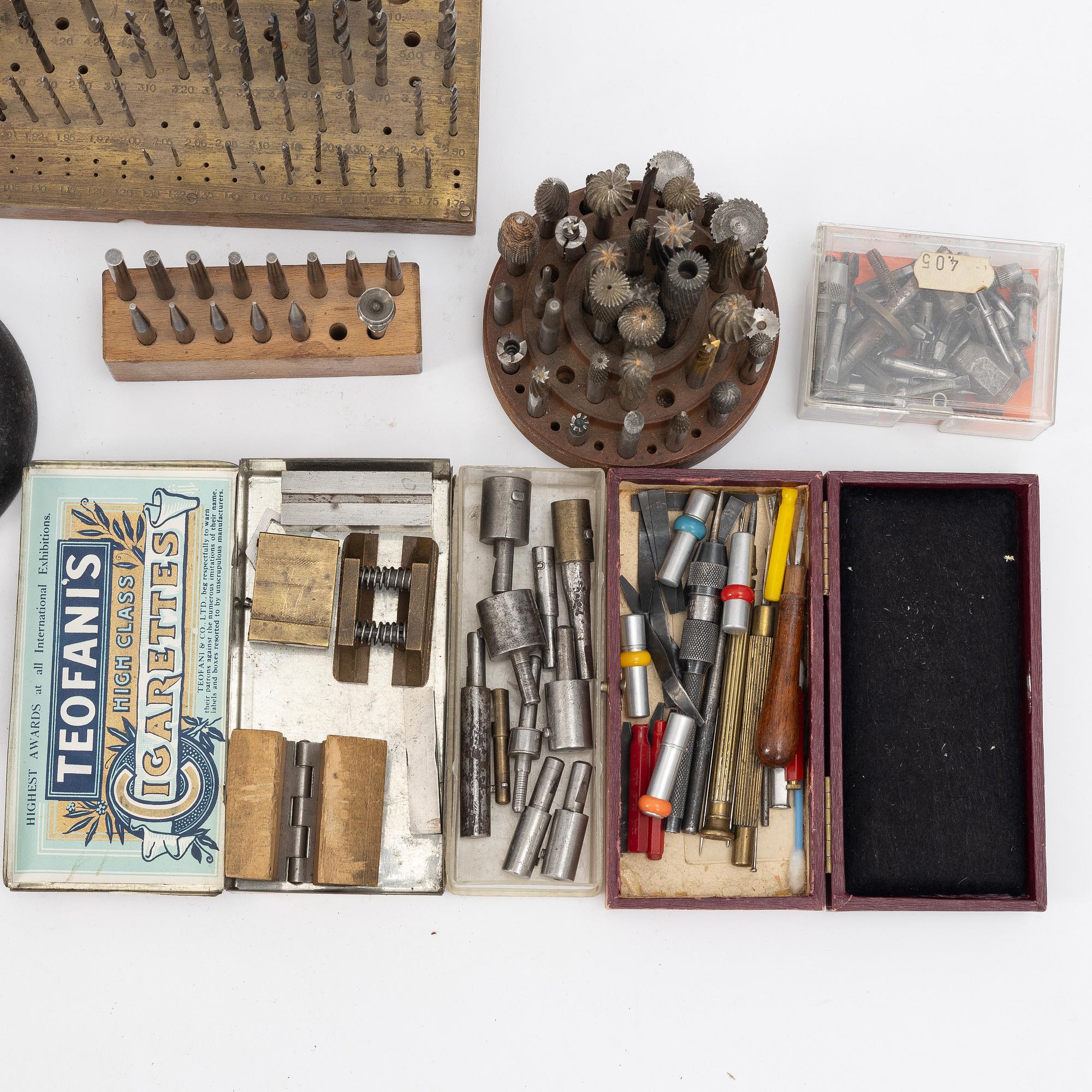Watchmaking tools and spare parts, including a lathe by Lorch.
