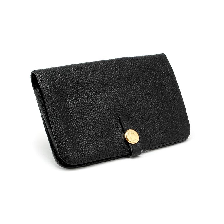 HERMÈS, a black leather wallet, "Dogon".