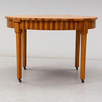 a dining table from the early 20th century.