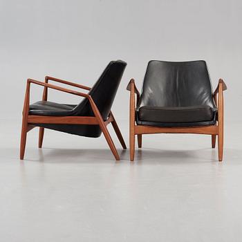 Ib Kofod-Larsen, a pair of 'Seal' easy chairs, Olof Persson Möbler, Sweden 1960's.