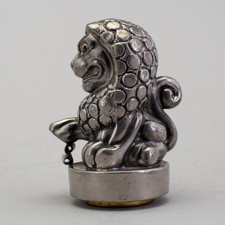 ANNA PETRUS, seal stamp with a brass stamp, pewter and brass, Svenskt Tenn, 1981 (year mark blurred).