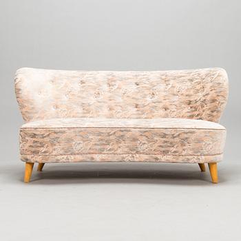 A mid-20th-century  sofa.