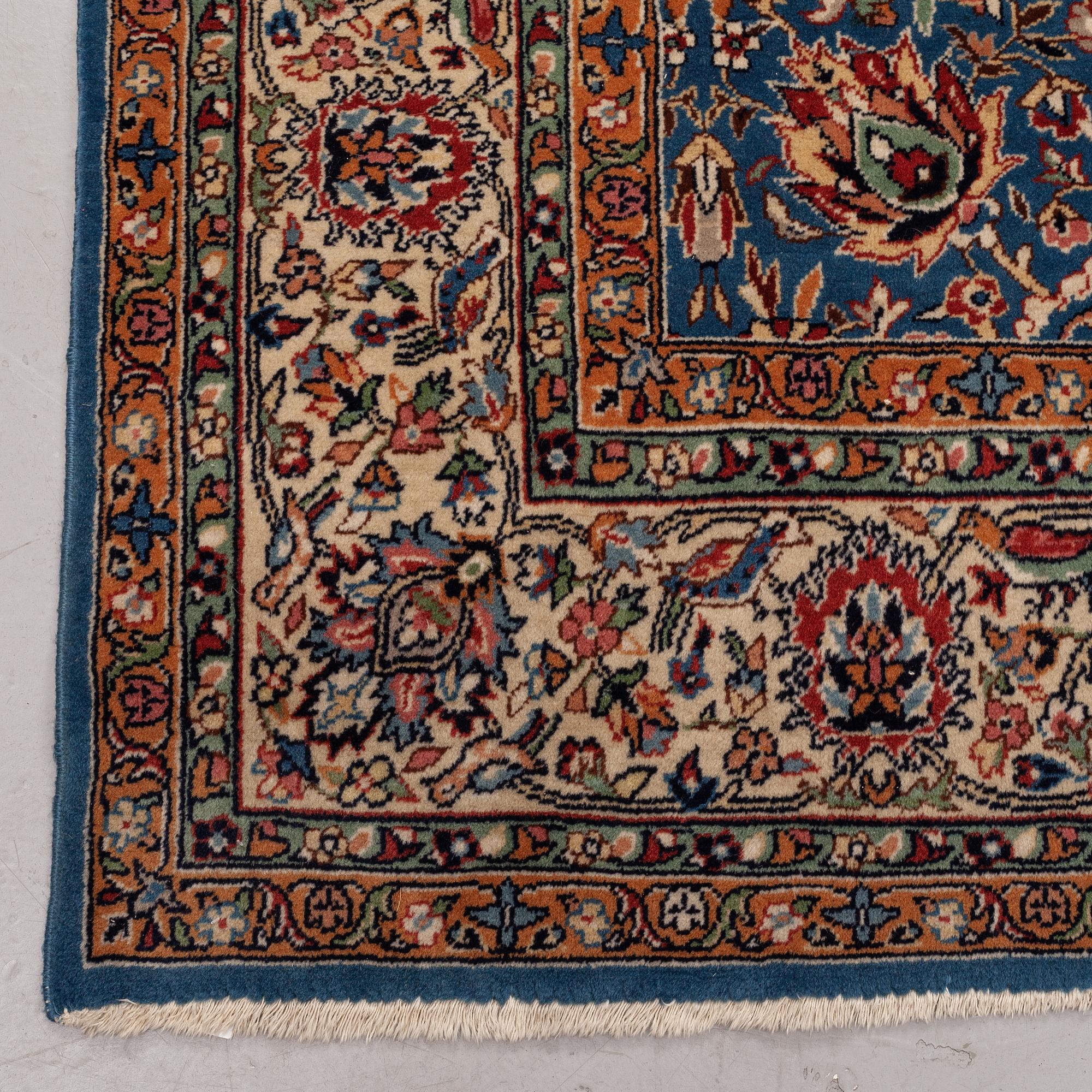 A carpet semi-antique/old oriental, ca 346 x 246 cm.