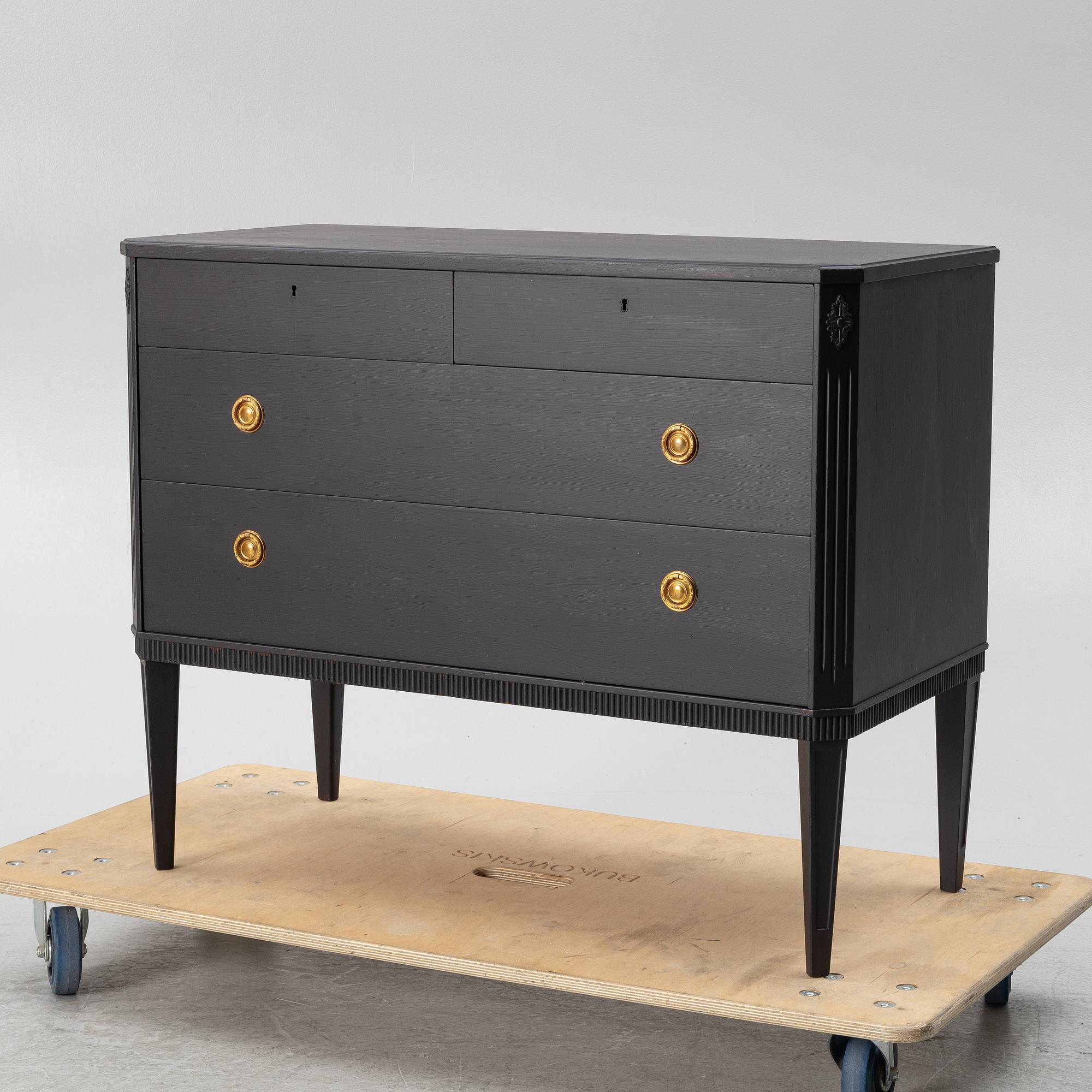 A chest of drawers, mid-20th century.